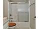 Bathroom featuring a sliding glass door shower and wood toilet seat at 17345 Northam Dr, Westfield, IN 46074