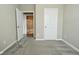 Neutral bedroom with ensuite bathroom, carpeted at 17345 Northam Dr, Westfield, IN 46074