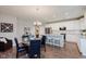 Modern eat in kitchen featuring white cabinetry, stainless steel appliances, and a breakfast bar for casual dining at 17345 Northam Dr, Westfield, IN 46074