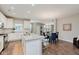Spacious kitchen and dining area featuring a large island with seating and modern appliances at 17345 Northam Dr, Westfield, IN 46074