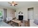 Living room with a fireplace, modern decor, and an inviting atmosphere perfect for relaxation and entertaining at 17345 Northam Dr, Westfield, IN 46074