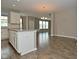 Open concept living room showcasing the kitchen island and dining room at 17345 Northam Dr, Westfield, IN 46074