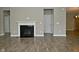 Living room features a black fireplace and neutral walls and floors at 17345 Northam Dr, Westfield, IN 46074