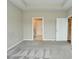 Spacious carpeted main bedroom with attached ensuite and walk-in closet at 17345 Northam Dr, Westfield, IN 46074