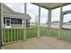 Enclosed screened-in patio overlooking a fenced-in backyard at 17345 Northam Dr, Westfield, IN 46074