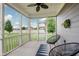 Screened-in porch with neutral siding, black patio furniture, and views of the backyard at 17345 Northam Dr, Westfield, IN 46074