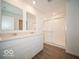 Modern bathroom with double vanity and walk-in shower at 6196 Granby Dr, Whitestown, IN 46075