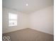 Bright bedroom with a window and neutral decor at 6196 Granby Dr, Whitestown, IN 46075