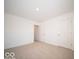 Spacious bedroom with neutral carpeting and doors leading to hallway and closets at 6196 Granby Dr, Whitestown, IN 46075