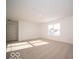 Bright bedroom featuring a large window and neutral walls at 6196 Granby Dr, Whitestown, IN 46075