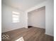 Bright foyer with vinyl plank flooring and access to other rooms at 6196 Granby Dr, Whitestown, IN 46075
