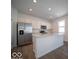 Modern kitchen with stainless steel appliances and kitchen island at 6196 Granby Dr, Whitestown, IN 46075