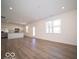 Open concept kitchen with stainless steel appliances and island at 6196 Granby Dr, Whitestown, IN 46075