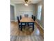 Open dining area with hardwood floors and neutral wall color at 927 Stockton St, Indianapolis, IN 46260