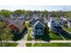Aerial view of a neighborhood with a gray craftsman home at 560 Jefferson Ave, Indianapolis, IN 46201