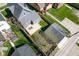 Aerial view of house, deck, detached garage, and yard at 560 Jefferson Ave, Indianapolis, IN 46201