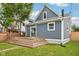 This backyard features a spacious wooden deck and a well-maintained lawn at 560 Jefferson Ave, Indianapolis, IN 46201