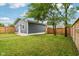 Backyard with a new shed, new fencing, and plenty of yard space at 560 Jefferson Ave, Indianapolis, IN 46201