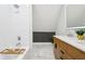 Modern bathroom with marble tile flooring, stylish vanity, and shower with subway tile at 560 Jefferson Ave, Indianapolis, IN 46201