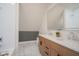 Modern bathroom with double vanity and marble countertops at 560 Jefferson Ave, Indianapolis, IN 46201