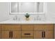 Spacious bathroom boasts double sinks, a stylish vanity, and marble countertops at 560 Jefferson Ave, Indianapolis, IN 46201