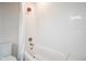 Clean bathroom with white subway tile and bathtub at 560 Jefferson Ave, Indianapolis, IN 46201