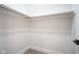 Spacious walk-in closet with double rods at 560 Jefferson Ave, Indianapolis, IN 46201
