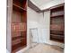 Large walk-in closet with ample shelving and hanging space at 560 Jefferson Ave, Indianapolis, IN 46201