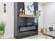 Modern fireplace with marble accents and a wooden mantel, creating a sophisticated focal point in the living room at 560 Jefferson Ave, Indianapolis, IN 46201