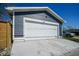New detached garage with white overhead door at 560 Jefferson Ave, Indianapolis, IN 46201