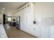 Modern kitchen with white cabinets, gold hardware and walk in pantry at 560 Jefferson Ave, Indianapolis, IN 46201