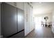 Modern kitchen with stainless steel refrigerator and white cabinets at 560 Jefferson Ave, Indianapolis, IN 46201