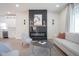 Light-filled living room features a modern fireplace and comfortable seating at 560 Jefferson Ave, Indianapolis, IN 46201