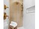 A modern shower featuring upgraded fixtures and white tile at 560 Jefferson Ave, Indianapolis, IN 46201
