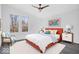 A bright bedroom with colorful decor, large windows, and neutral walls provides a tranquil retreat at 7650 Clarion Dr, Indianapolis, IN 46236
