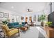 Modern living room with stylish furniture, contemporary décor, and large windows for plenty of natural light at 7650 Clarion Dr, Indianapolis, IN 46236