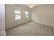 Bedroom with neutral carpet, fresh paint and bright windows at 11704 Gray Eagle Dr, Fishers, IN 46037