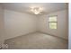 Cozy bedroom features neutral carpet, white walls, and a ceiling fan with lighting fixture at 11704 Gray Eagle Dr, Fishers, IN 46037
