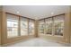 Bright breakfast nook with tile floor and multiple windows at 11704 Gray Eagle Dr, Fishers, IN 46037