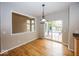 Sunlit breakfast nook next to the kitchen and a sliding glass door at 11704 Gray Eagle Dr, Fishers, IN 46037