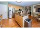 Modern kitchen with stainless steel appliances and a large kitchen island at 11704 Gray Eagle Dr, Fishers, IN 46037