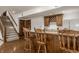 A view of the basement bar with wooden bar stools at 1462 Eagle Trace Ct, Greenwood, IN 46143