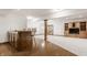 Open basement layout with bar, tv area, and french doors at 1462 Eagle Trace Ct, Greenwood, IN 46143