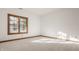 A bedroom with a window featuring dark wood trim at 1462 Eagle Trace Ct, Greenwood, IN 46143