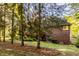 Well-maintained home exterior with lush backyard, mature trees, and manicured lawn provides an ideal setting at 1462 Eagle Trace Ct, Greenwood, IN 46143