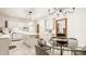 Eat-in kitchen with modern island, stainless appliances and pendant lighting at 1462 Eagle Trace Ct, Greenwood, IN 46143