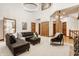 Spacious living room with fireplace, plush sectional sofa, and ample seating at 1462 Eagle Trace Ct, Greenwood, IN 46143