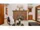 Charming living room with a brick fireplace, wet bar, and natural light at 1462 Eagle Trace Ct, Greenwood, IN 46143