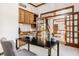 Spacious office with custom wood cabinetry, a modern desk, and stylish decor at 1462 Eagle Trace Ct, Greenwood, IN 46143