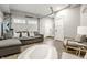 Spacious finished basement with a gray sectional, entertainment area and recessed lighting, great for entertaining at 545 Fletcher Ave, Indianapolis, IN 46203